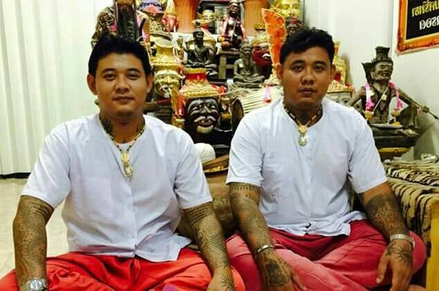 Sak Yant bamboo tattoo by Ajarn Tom in Bangkok, traditional Thai hand-poked style